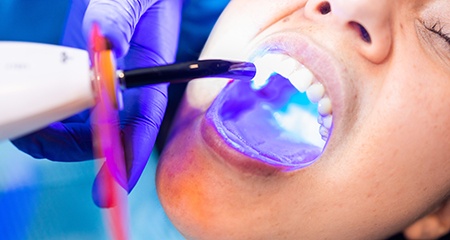 Patient receiving cosmetic dental bonding