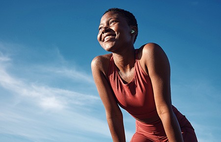 Lady smiles outdoors