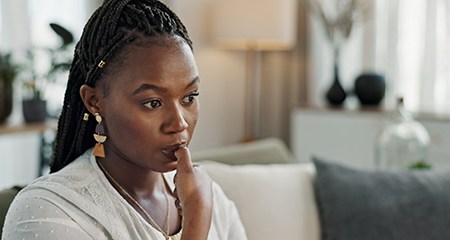 Closeup of woman biting her nails