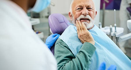 Dental implant pain is one symptom of dental implant failure